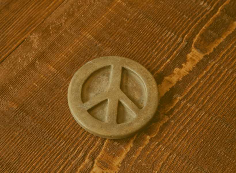 Peace symbol reversed connotation