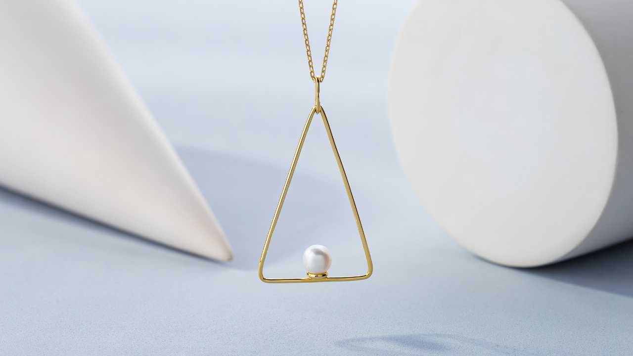 Upside Down Triangle Necklace Meaning
